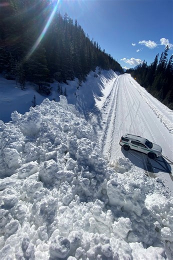 Controlled avalanche bombing triggers size 4 slide on Icefields Parkway, cleanup continues to get highway open