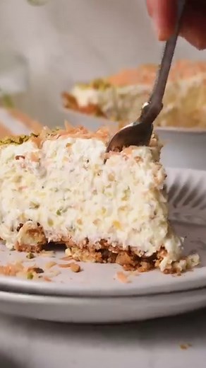 Ever tried Million Dollar Pie? This Southern classic lives up to its name with a rich creamy filling loaded with pineapples, coconut and pistachios. The classic recipe calls for pecans, but pistachios are a game changer. I also added cream cheese for extra richness. Seriously, where this dessert has been all my life? Enjoy! Recipe Serving 8 For the crust 2 cups graham crackers 6 tbsp butter melted 1/4 cup sugar For the filling 1 (8 oz )package cream cheese 1 (14 oz) condensed milk 1 (20 oz) crus