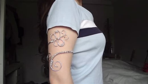 telysiajewellery on Instagram: "Baby blue butterfly arm cuff on my vinted! @/ tiaelysia (link in bio!!) #armcuff #fairy #wirewrapjewelry #y2k #digicam"