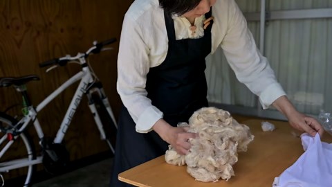 The Journey of Making a Stole from Raw Wool in a Cozy Workshop