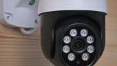 CCTV camera rotates and records moving objects. Security camera...