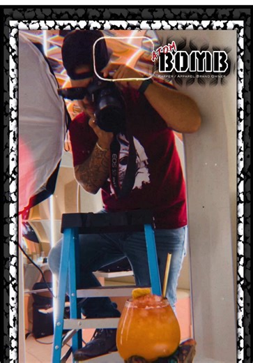Atom Bomb Creative Designs is booked and busy with Atom Bomb on a shoot wearing the “Bomber” Tee available at bombapparel.com #atombomb #bombapparel #photographer #photography #bomber