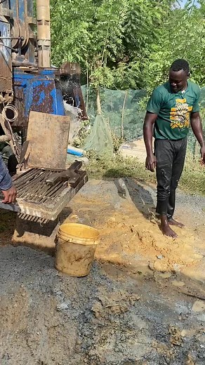 Manual Grinding Machine Operation in Rural Setting
