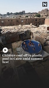 Om Aya, 52, is known in the Al Duwaiqa neighbourhood for setting up a plastic swimming pool to earn a living and bring joy to Cairo's children. | The National