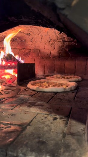 Wood fired pizza oven action 🔥🪵🍕 We only use natural fuel for our ovens for that smokey and high heat intensity! Drop by and taste the difference! See you! Ciao! 🖐️ #pizza #pizzas #pizzalover #woodfiredpizza #woodfiredoven #brickoven #brickovenpizza #food #foods #foodie #foodies #foodlover #foodporn #foodgasm #foodtok #foodtiktok #tiktok #fy #foryou #fyp #foryoupage #fypp #fypage #fypシ #fypviral #fypviralシ #fyppppppppppppppppppppppp #instagram #capcut | Classio Mobile Wood Fired Oven - Lacso