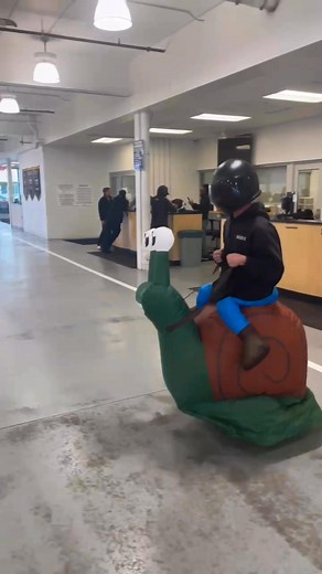 Everyone meet Matt. Matt is one of our service porters here at the dealership. He would have taken a photo with everyone else this morning but I think his ride may have been a little slow and caused him to be late to the party. 😅 Amazing costume Matt! 🐌 #betterlatethannever #Halloween #fridayvibes #dealershiphumor #DealershipLife | Serra Chevrolet Sterling Heights