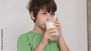 Kid enjoying a fresh yogurt, the mustache signifying wholesome indulgence. Great for use in lifestyle magazines promoting nutritious eating.