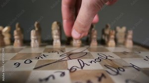 Person move piece male arm pawn unusual chess closeup in form of lion slowmotion
