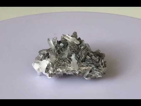 Axinite with transparent Quartz and tabular Calcite