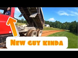 Repairing a driveway using John Deere 110 TLB