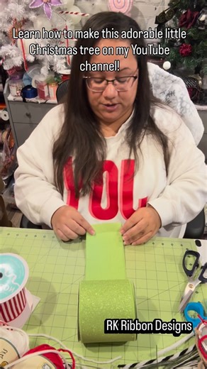 This started out as a cute little Christmas tree ornament, and then turned into the cutest little Christmas tree decoration! Hop on over to my YouTube channel for the full video! #christmas #diychristmas #ribboncrafts #handmade #ribbon #christmastree | RK Ribbon Designs