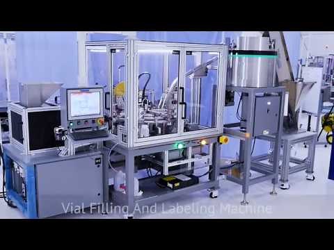 Automated vial filling, capping and labeling machine with a FANUC SR-3iA SCARA Robot