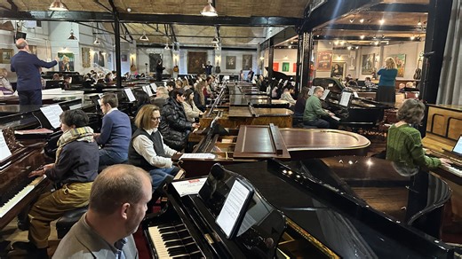 135 pianists play over a hundred pianos simultaneously at huge fundraiser