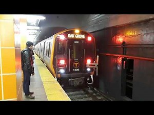 Boston MBTA New Orange Line Trains Arriving at State Street Station ( New Trains in service )