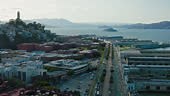 Aerial establishing shot of San Francisco on a summer evening, flying...