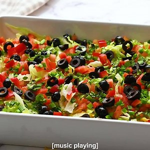 This taco dip is perfect with tortilla chips and great for parties! https://amandascookin.com/taco-dip/ | Things I Love
