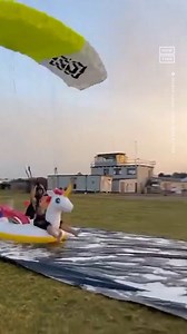 ‘I’m coming for you’ — A skydiver, dubbed ‘Unicorn Man,’ made an impressive landing onto an inflatable unicorn 🦄 #WatchThis | NowThis