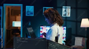 Developer doing software debugging using laptop, checking glitches in lines of code, upset about errors. Woman walking around home fixing coding issues using notebook device, camera B