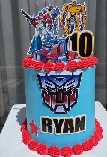 Transformers Cake Inspired by Bumblebee and Optimus Prime
