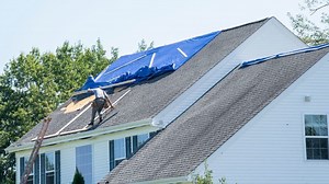 Neighbors turn the tables and fix handyman's roof