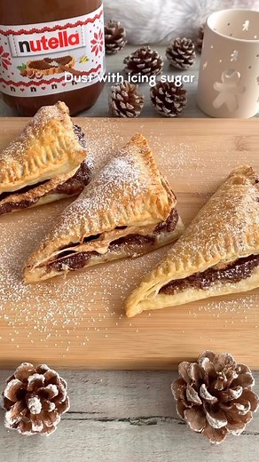Tasty Food By Nadia on Instagram: "Sweet and crisp puffy pastry, stuffed with Nutella and gooey marshmallow 😋"