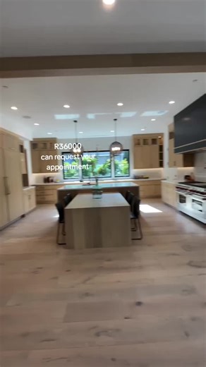 Sculptural Kitchen Island with Double-Sided Functionality