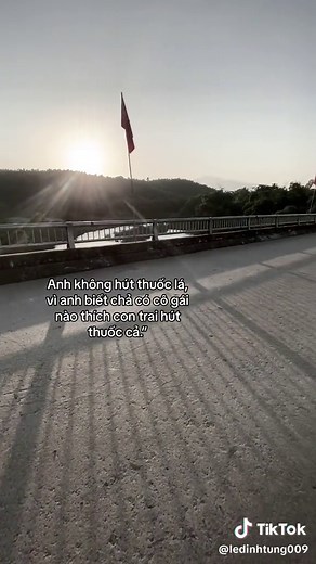 Walking on a Scenic Bridge at Sunset