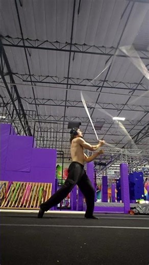 Giant Cube Spinning Circus Performer