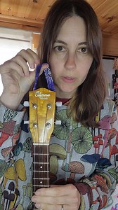 1.2K views · 21 reactions | From our friends at The Hug Strap: Looking for a convenient solution to hanging your ukulele on the wall that doesn't involve a drill? With just a regular nail and one of these ukulele hangers from the Hug Strap will do the trick! Learn more by watching the video. Purchase your ukulele hanger at www.thehugstrap.com/products/ukulele-hanger-patterns | Ukulele Magazine | Facebook