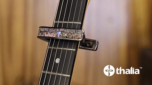 Thousands of 5-star reviews, 6 major design awards and countless YouTube reviews are proof that the Thalia Capo is the best capo ever. The only capo that can match your guitar's unique fretboard radius, keeping you in tune! | THALIA CAPOS