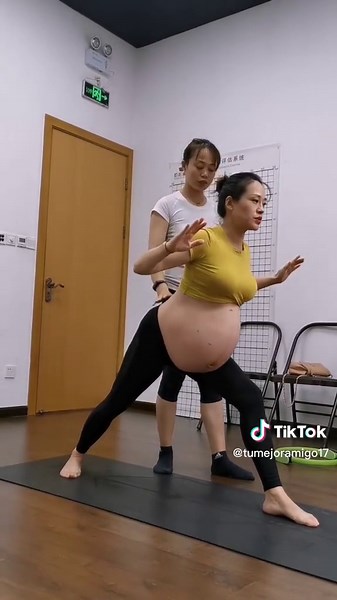 Pregnant Chinese Women Showing Off Big Bellies in Yoga