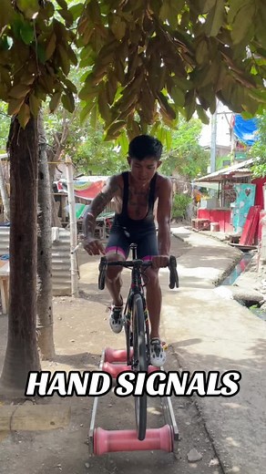 Essential Hand Signals for Safe Cycling