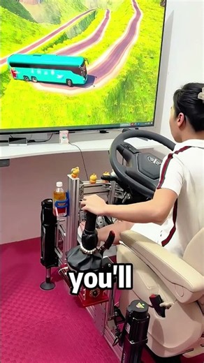 She’s playing a car driving game