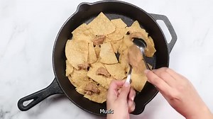 Cheesy baked nachos layered with refried beans, black olives, corn, and tomatoes topped with salsa, Guacamole, jalapeño, and sour cream. Does anything sound better?? To get more detailed instructions, helpful tips, or to print the recipe click below: Link: https://www.errenskitchen.com/oven-baked-nachos-and-cheese/ | Erren's Kitchen | Facebook