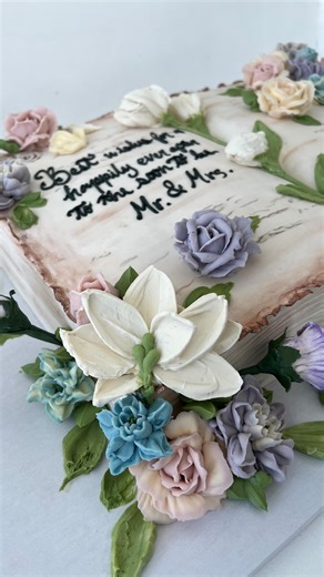 The Dessert Ladies ™ on Instagram: "The way we SWOONED when our cake artist Dani revealed this masterpiece! 🤯😍 A custom botanical book cake for a very special Bride to Be! Each delicate buttercream flower, yes!! BUTTERCREAM! Was hand piped and gently arranged to create the most ethereal bridal shower cake ever. If you’d like to wow your guests for a bridal shower or communion or baptism with a similar design send us an email at Order@DessertLadies.com with your event details and we’ll nail it