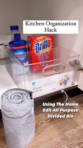 Looking for a simple storage solution for your trash bags? Try this kitchen hack! 💙 #ProTip: thread trash bags through the handle of The Home Edit All Purpose Divided Bin to grab for later. SHOP: https://container.store/3AO5ypy at #TheContainerStore #ContainerStoreTips | The Container Store