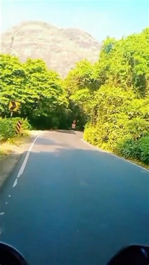 Peaceful Bike Ride Through Green Hills 🌿🏍️ #travel #shorts