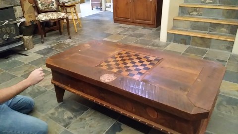 Guy Shows off Table With Hidden Compartments