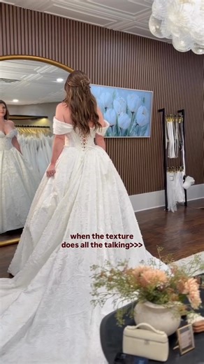 When the texture makes the moment 🕊️ A jacquard dream that’s all about detail and dimension. #weddingdress #weddingdresses #arkansasbride #arbride #arkansasbridal #jacquard #arkansaswedding #arkansasweddingphotographer #arkansasweddingdress #bridalshop | The Vogue Veil
