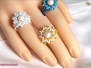 24K views · 849 reactions | How to Make Beautiful Floral Beaded Ring Tutorial | Wedding Decoration Ideas | Facebook