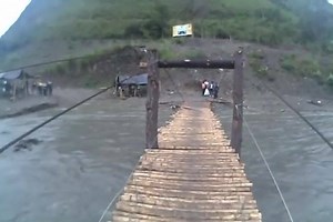Some of you considered yourselves game for the last bridge crossing video we posted... but would you cross this one? | Adventure Moto Australia