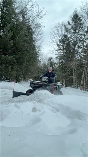 Plowing snow with an ATV
