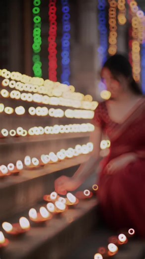 🤭😁 Gemini🫡#sofee🐼🐾️✨️🌻 @🦋🦋🎀Copy this prompt 👉 Create:A beautiful young woman in a stunning red transparent saree with a matching blouse is joyfully celebrating Diwali night. She is holding a glowing phool jhadi (sparkler) in her hand, the golden sparks Lighting up her face with a festive glow. Her expression is filled with happiness and excitement as the sparkling Light reflects in her eyes. In the background, a Large festive crowd is also celebrating Diwali, Lighting diyas, waving spa