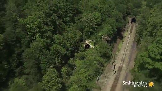 🗓#OTD in 1861, Residents of western Virginia voted to secede from the Confederate state of Virginia. The railroad tracks that crisscross West Virginia pass through the state's mountains - an engineering feat made possible by the steam-powered drill, or, according to legend, a man named John Henry. Aerial America: West Virginia airs tonight at 11 PM! | Smithsonian Channel
