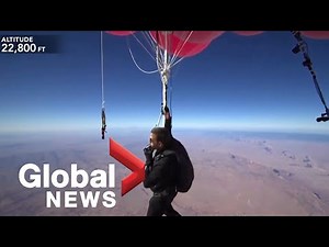 Daredevil David Blaine floats high above Arizona desert on balloon