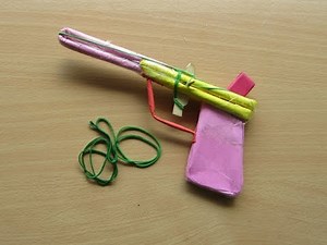 How to Make a Paper Machine Gun that shoots more rubber bands - Easy Tutorials
