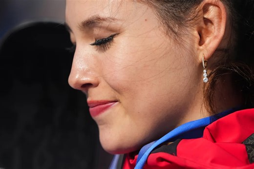 Eileen Gu in tears after defending her Olympic halfpipe title, learning of her grandmother’s death