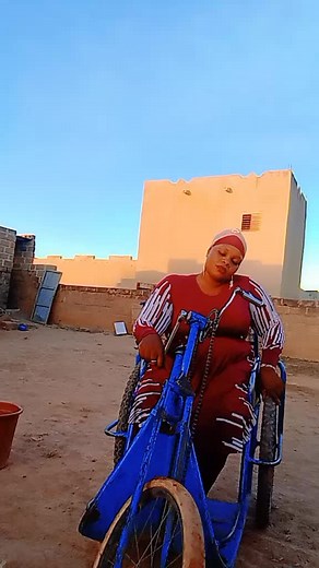 Stylish Red Dress Adventures on a Blue Bicycle
