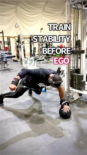 Durable Strength Coach | Veteran on Instagram: "This isn’t a shoulder exercise — it’s a stability test. One hand anchors on the kettlebell. The other arm moves the load. Your core, hips, and shoulder have to keep everything from twisting apart. That’s how you build durable strength — the ability to produce force without losing position. Strong muscles are easy. Controlled strength is rare. #GZN #GainzNation #AntiRotation #DurableStrength #ShoulderHealth"