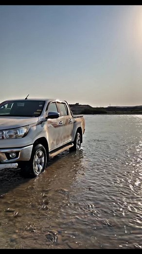 Toyota Hilux Pickup Truck in Shallow Water